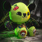 Green plush toy with tattoos and cherries on a dark background